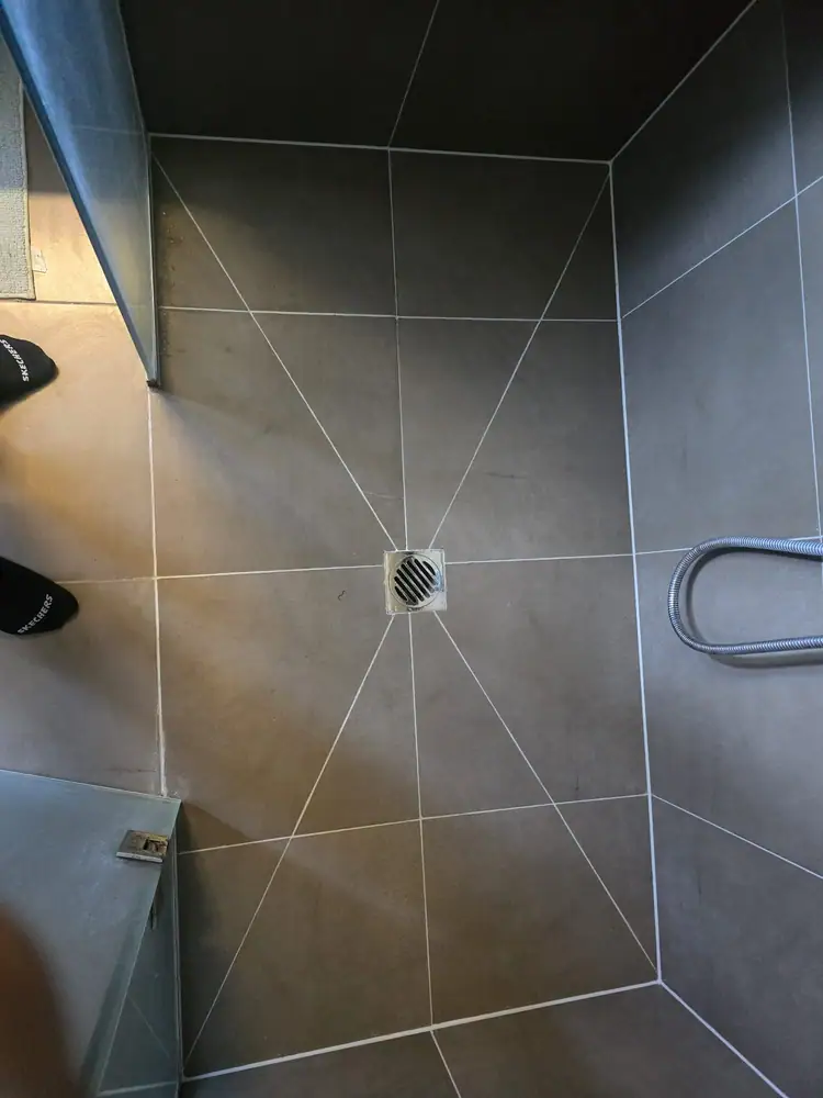 Completed epoxy grout shower floor repair