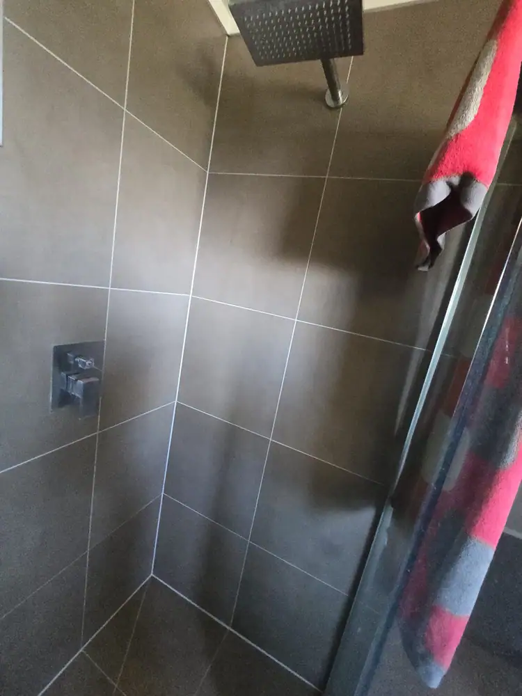 Completed shower wall regrouting in Auckland