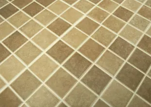 Tiled floor restored with grout colour sealing